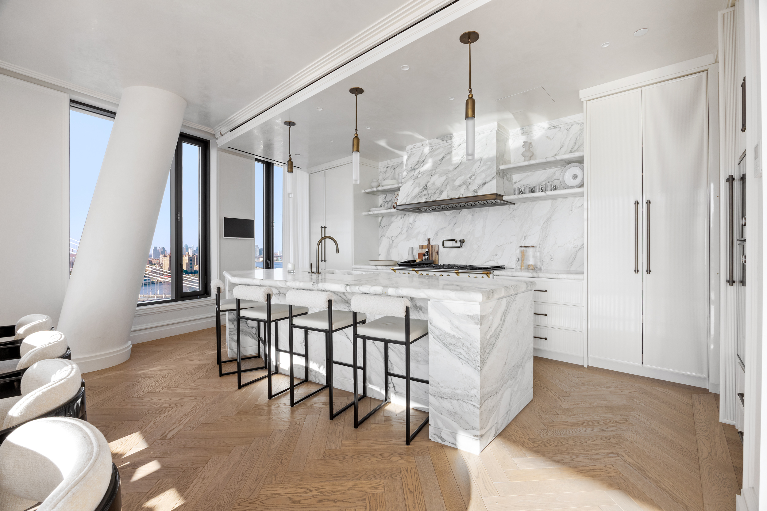 30 Front Street, Unit 25A Brooklyn, NY 11201 - Photo 13 of 45 a kitchen with kitchen island granite countertop a sink cabinets and stainless steel appliances