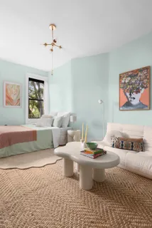 a living room with furniture and window