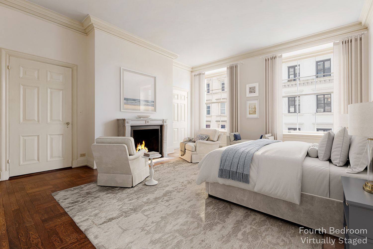 a bedroom with a bed and a fireplace