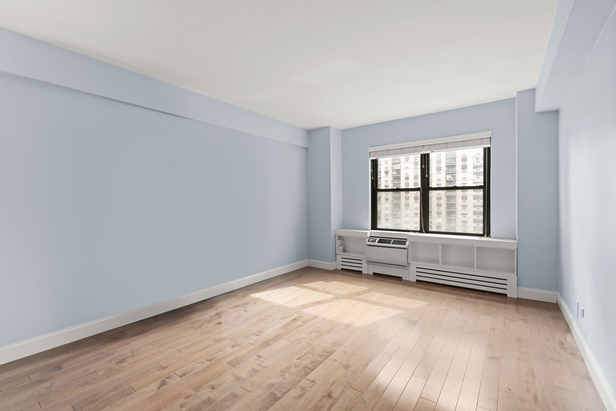 2 Tudor City Place, Unit 6JOS Manhattan, NY 10017 - Photo 15 of 16 an empty room with windows