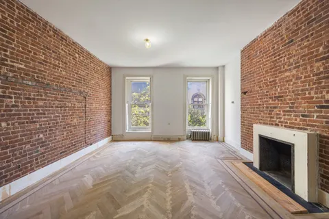 a view of empty room with front door
