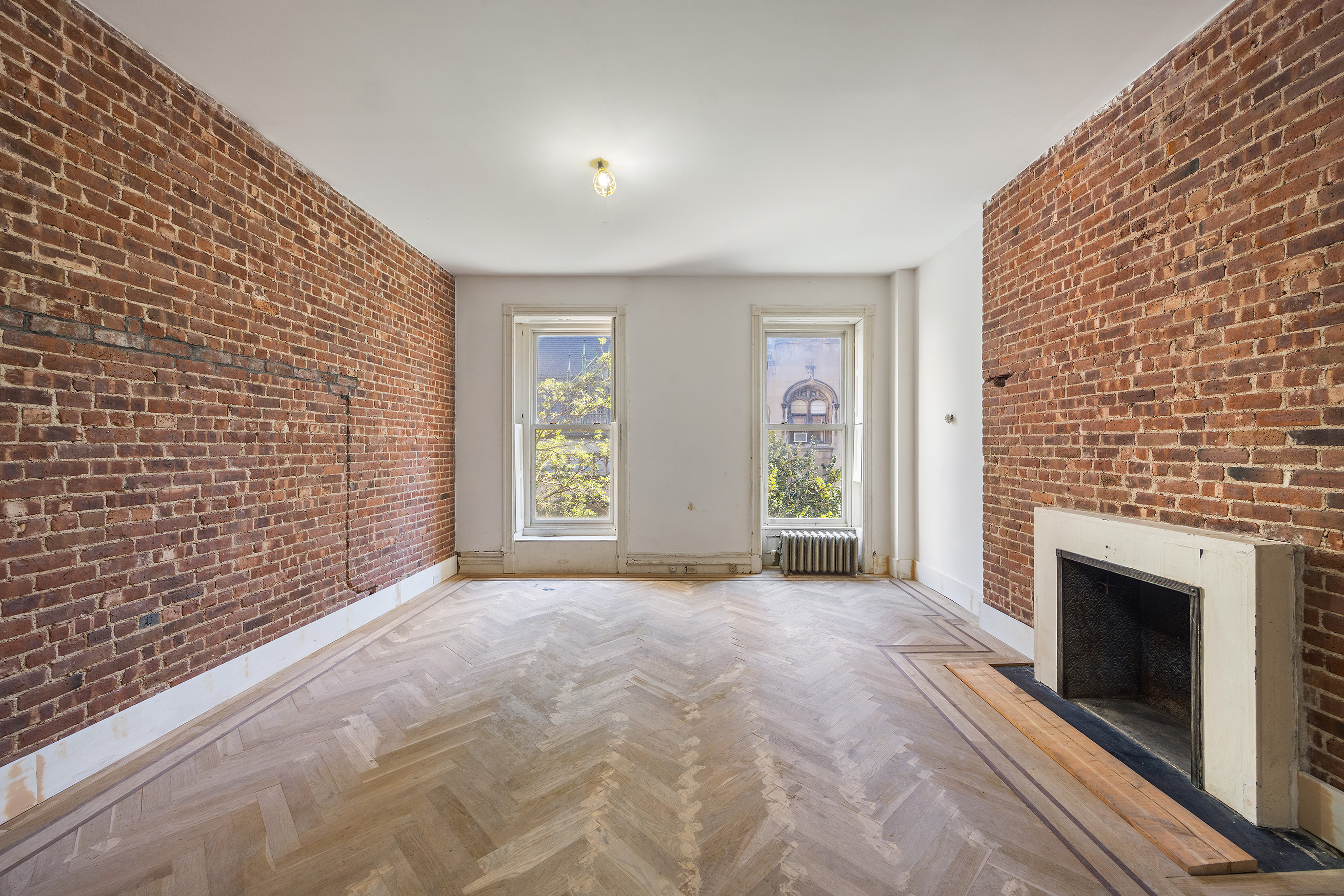 38 East 73rd Street Manhattan, NY 10021 - Photo 7 of 25 a view of empty room with front door