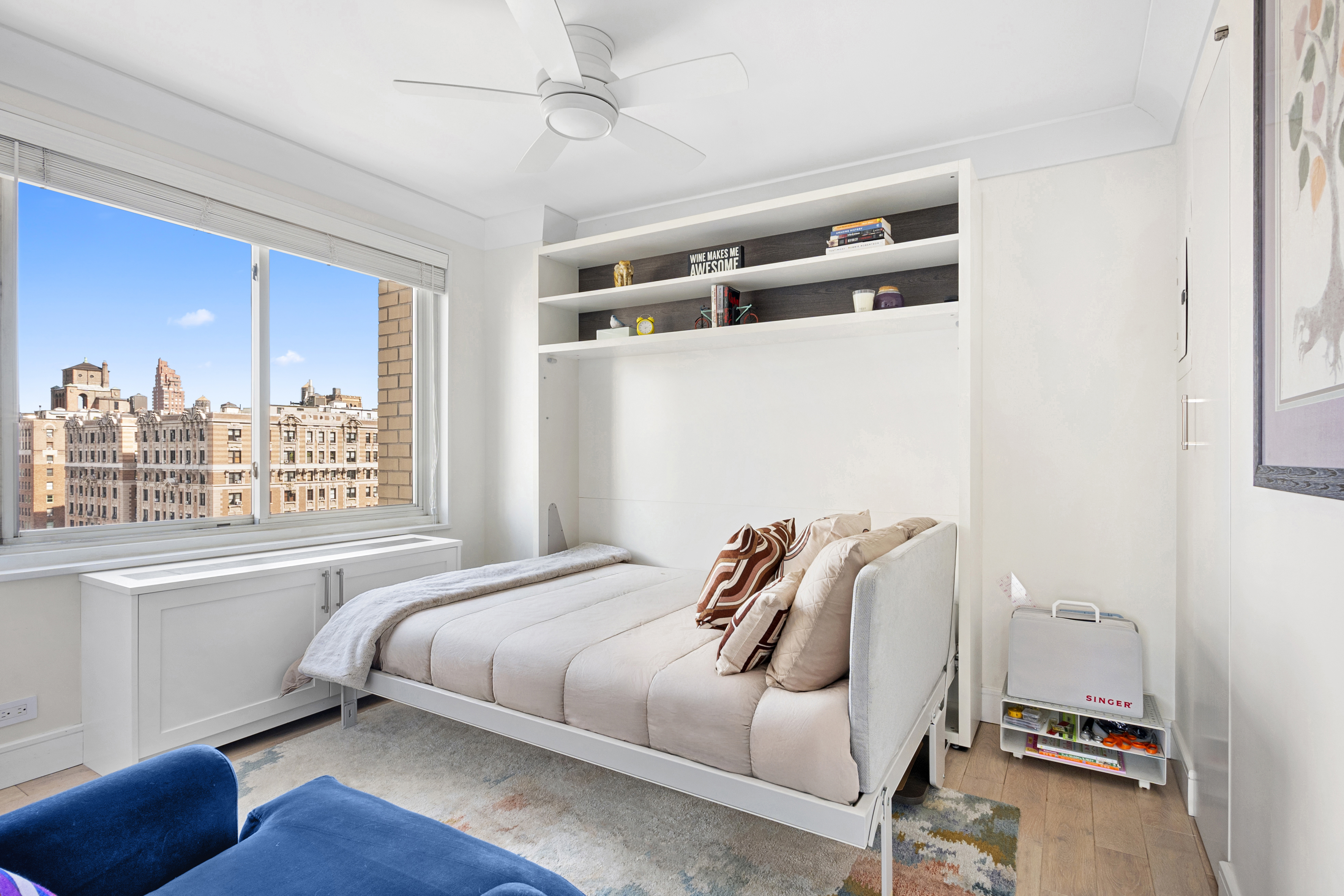 201 West 70th Street, Unit 16C Manhattan, NY 10023 - Photo 5 of 20 a bedroom with a bed and a window