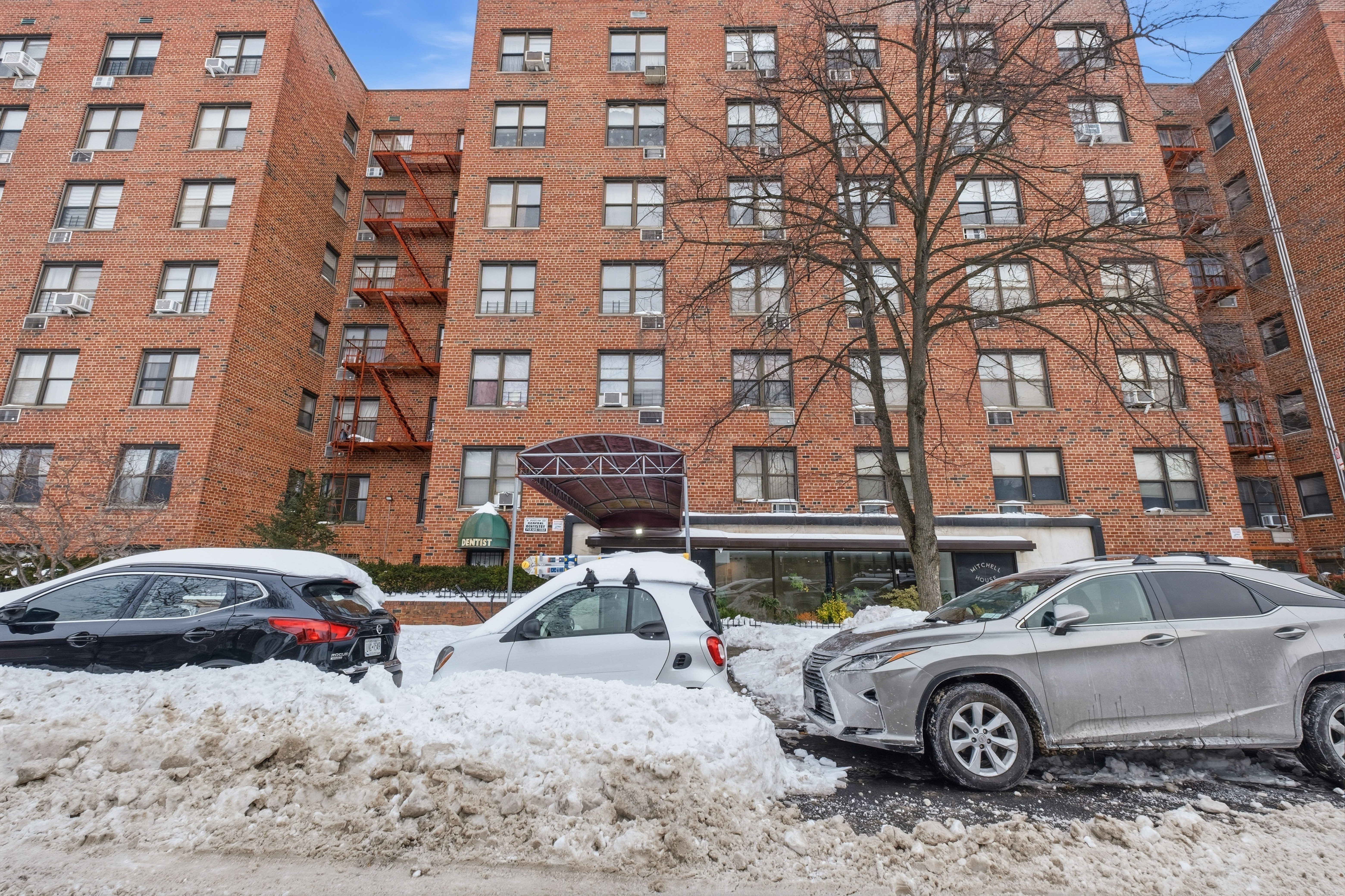 1577 East 17th Street, Unit 2F Brooklyn, NY 11230 - Photo 21 of 21 a front view of a building with parking space