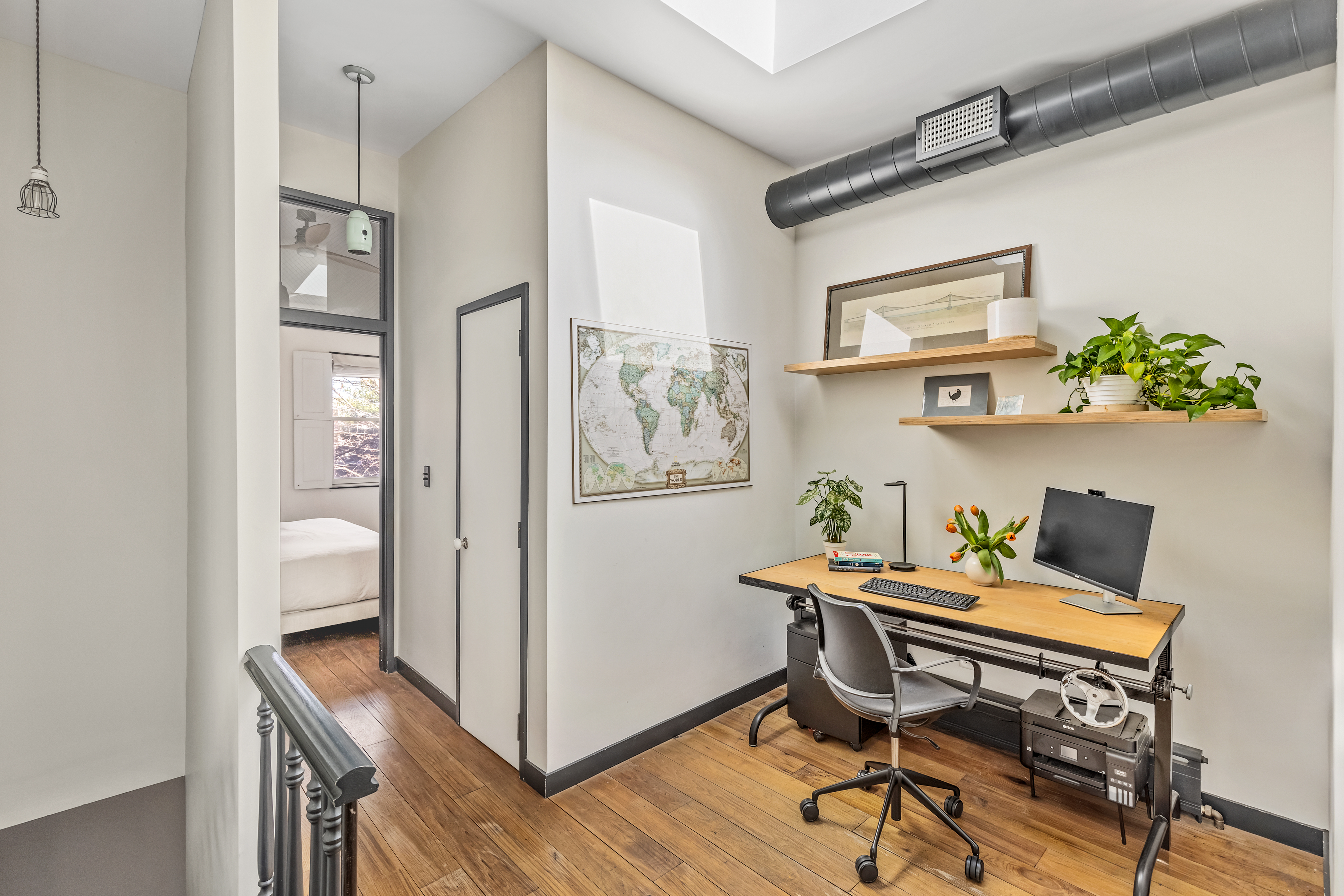 162 10th Street Brooklyn, NY 11215 - Photo 9 of 13 a workspace with furniture and window