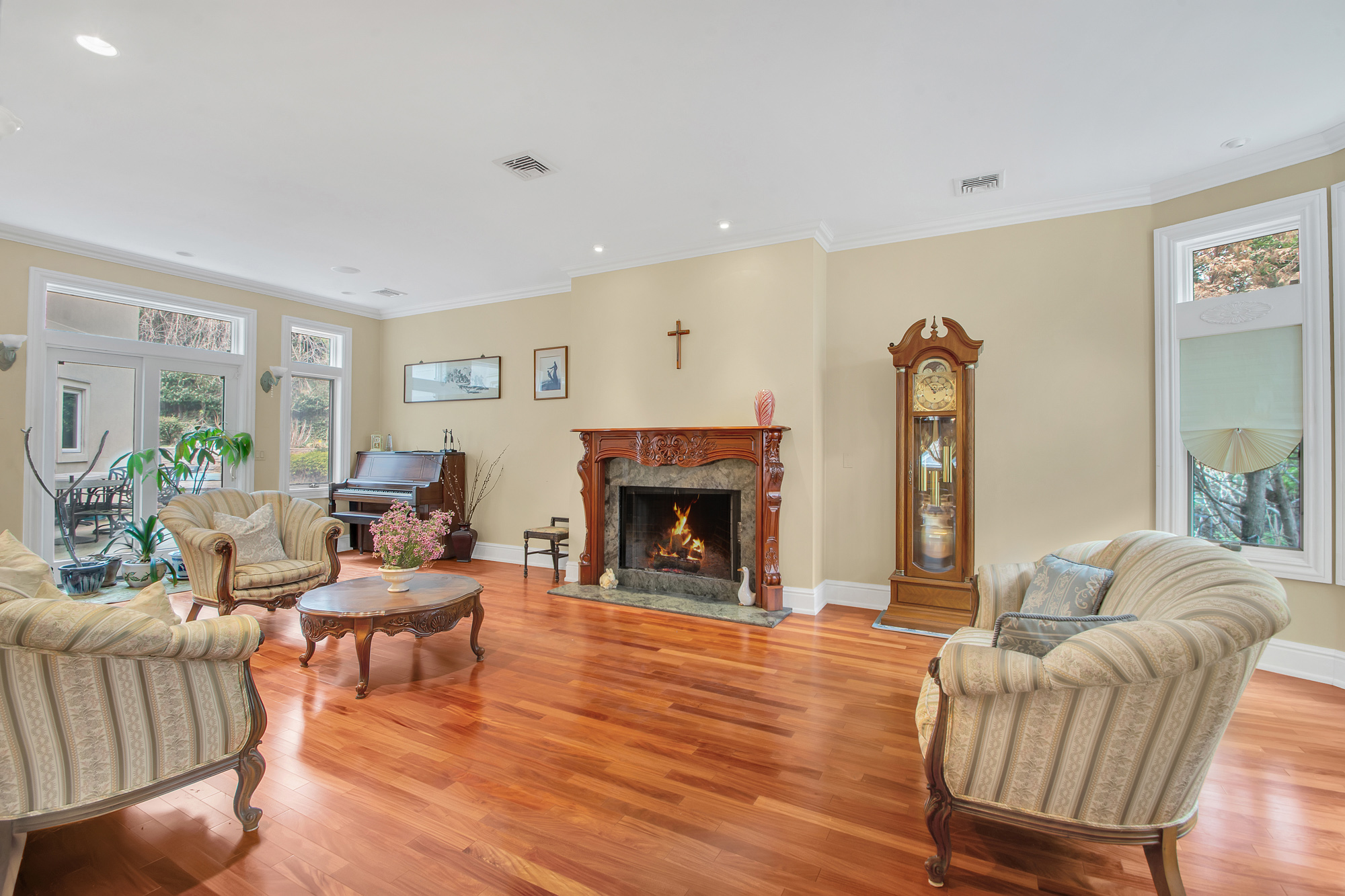 68 Circle Road Staten Island, NY 10304 - Photo 3 of 38 a living room with furniture and a fireplace