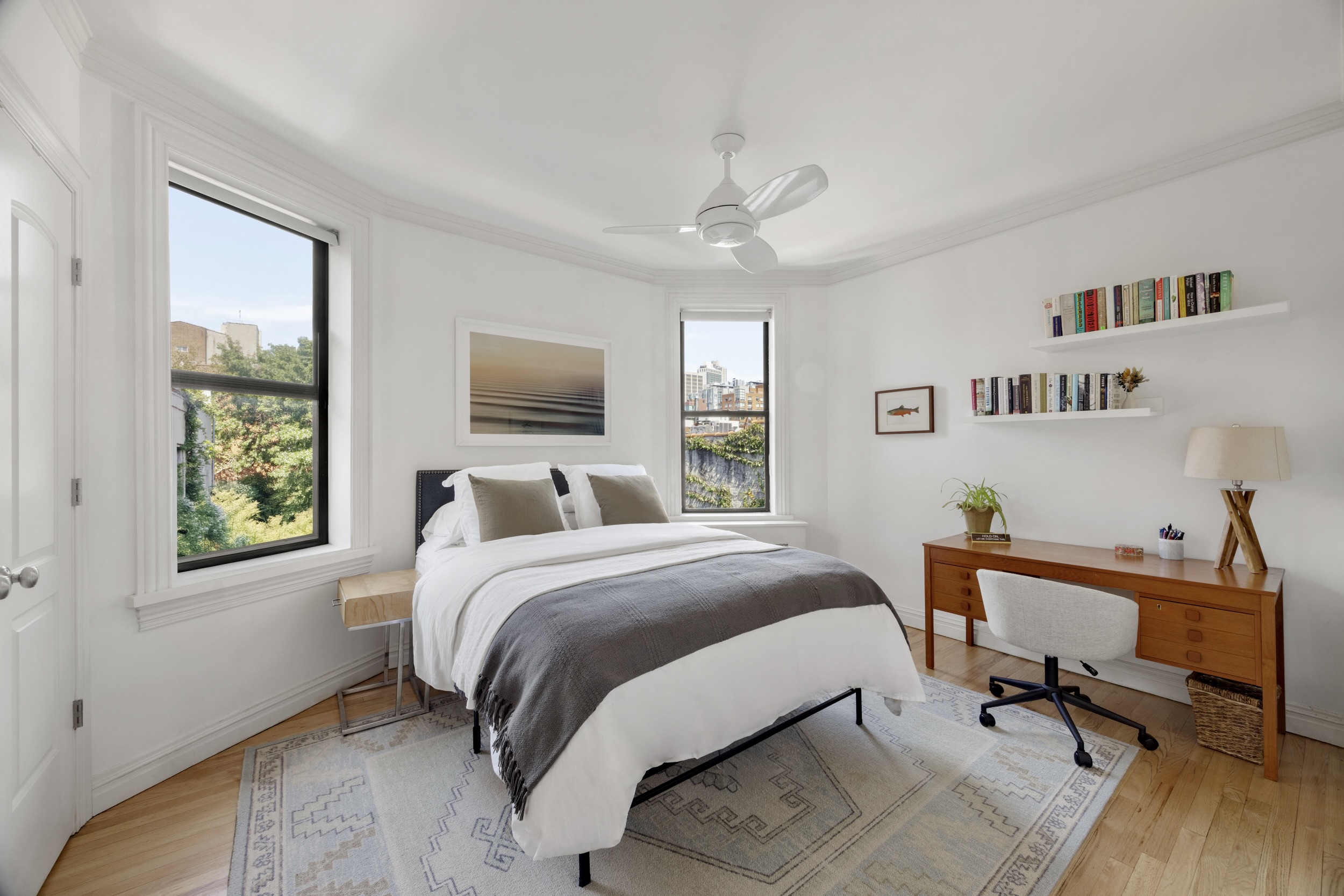 209 Clinton Street, Unit 4L Brooklyn, NY 11201 - Photo 11 of 17 a bed room with a bed and a window