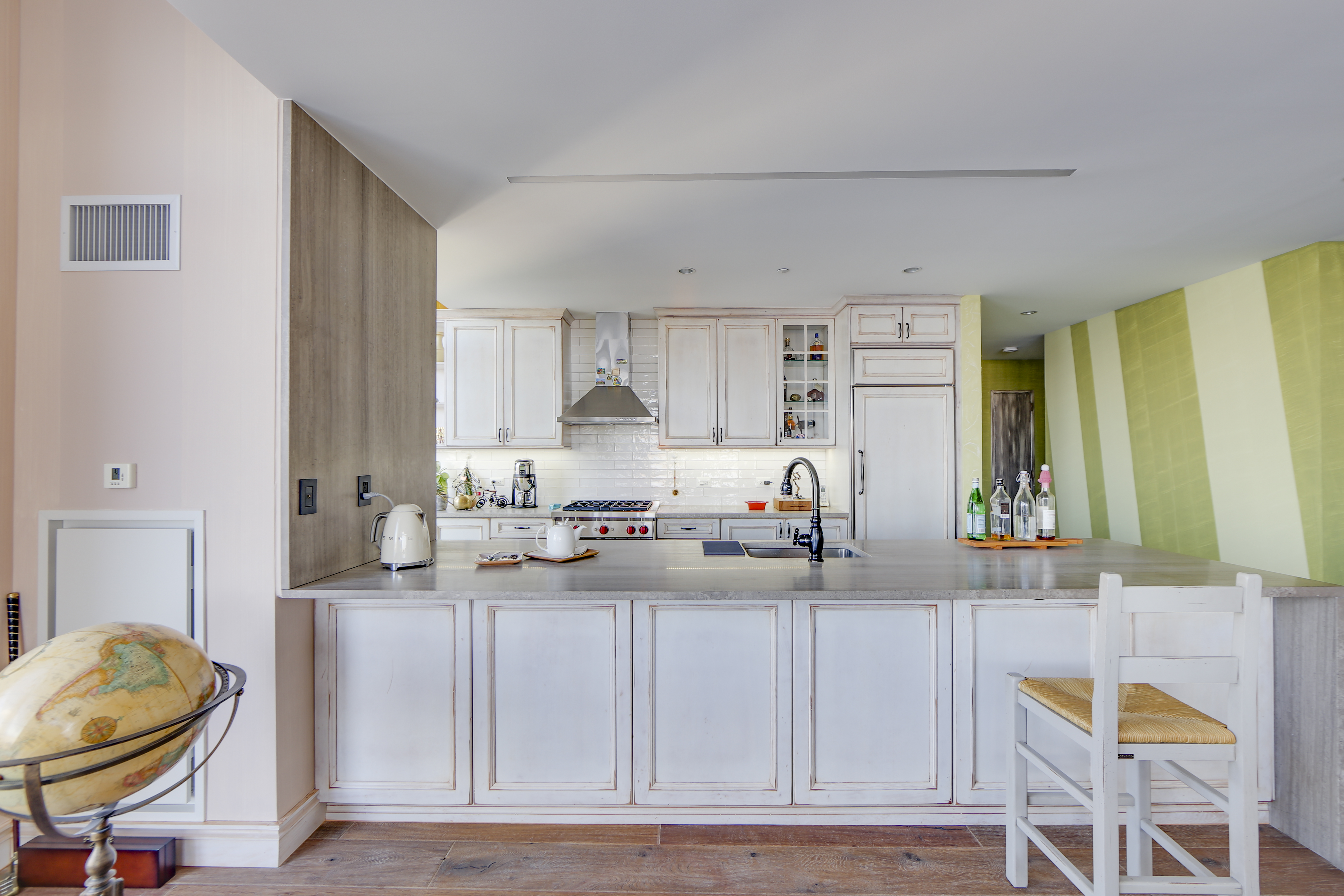 2 Northside Piers, Unit 27P Brooklyn, NY 11249 - Photo 5 of 19 a kitchen with granite countertop a stove a sink and a granite counter tops