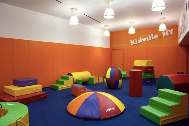 80 Riverside Boulevard, Unit 12D Manhattan, NY 10069 - Photo 11 of 16 a living room with furniture and a lamp