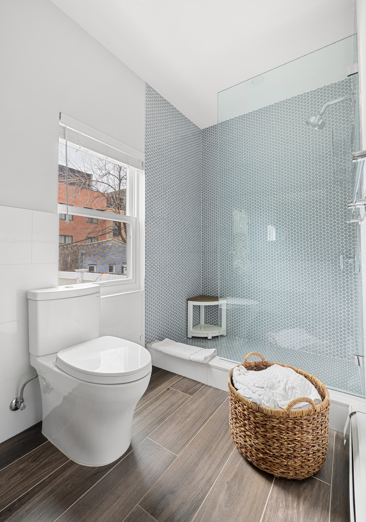 202 22nd Street Brooklyn, NY 11232 - Photo 18 of 28 a bathroom with a sink toilet and window