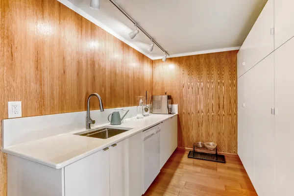 a bathroom with a sink and a shower