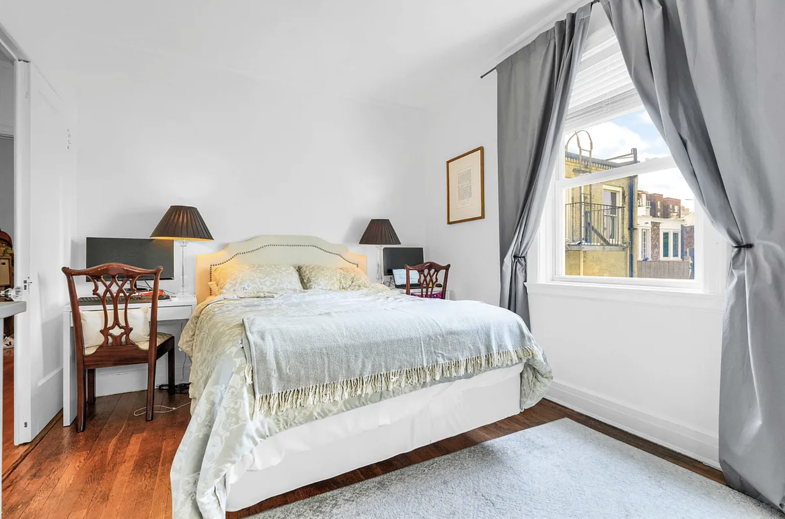 12 Clark Street, Unit 5B Brooklyn, NY 11201 - Photo 3 of 9 a bedroom with a bed and window