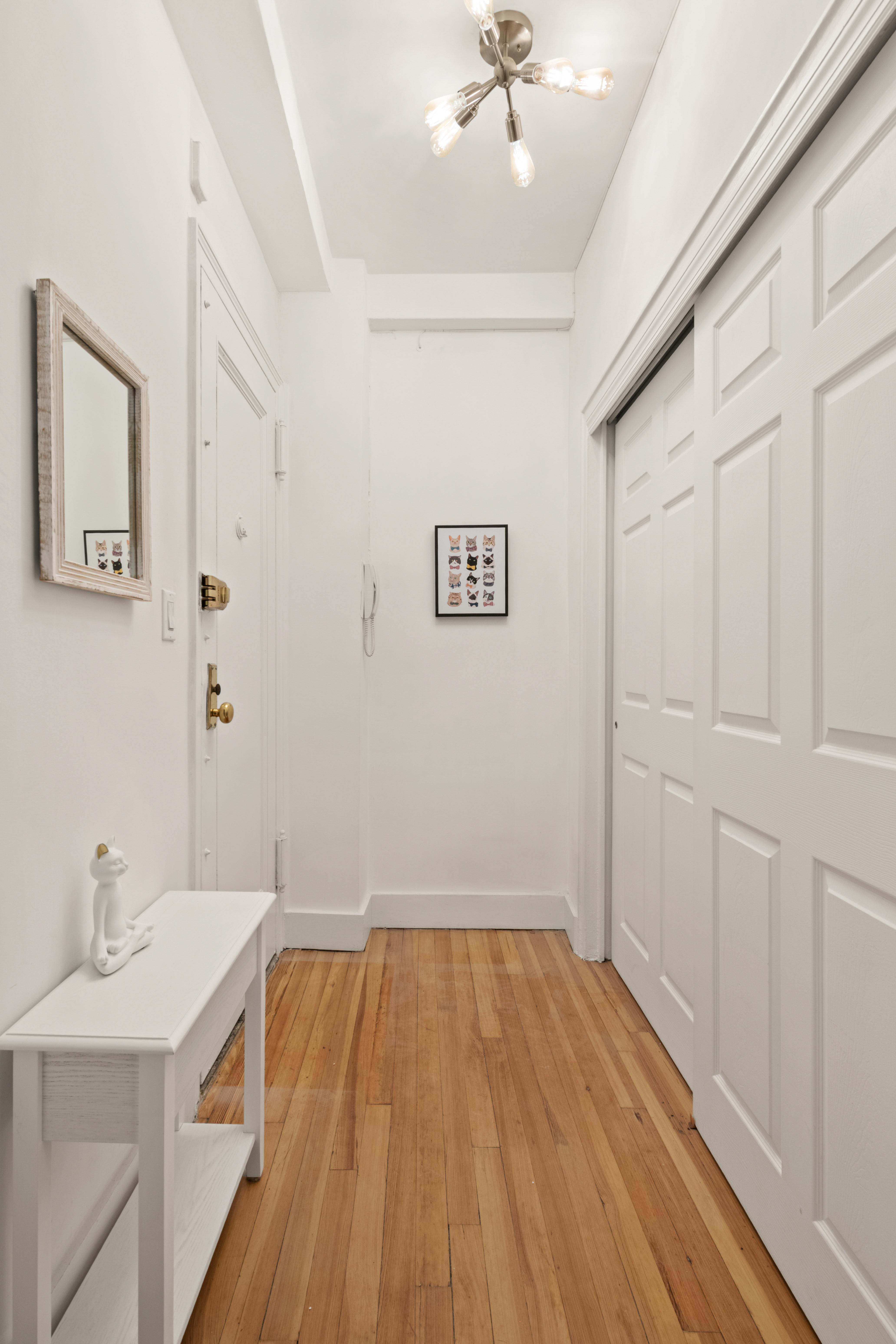 33 Riverside Drive, Unit 4D Manhattan, NY 10023 - Photo 6 of 9 a bathroom with a sink and a mirror