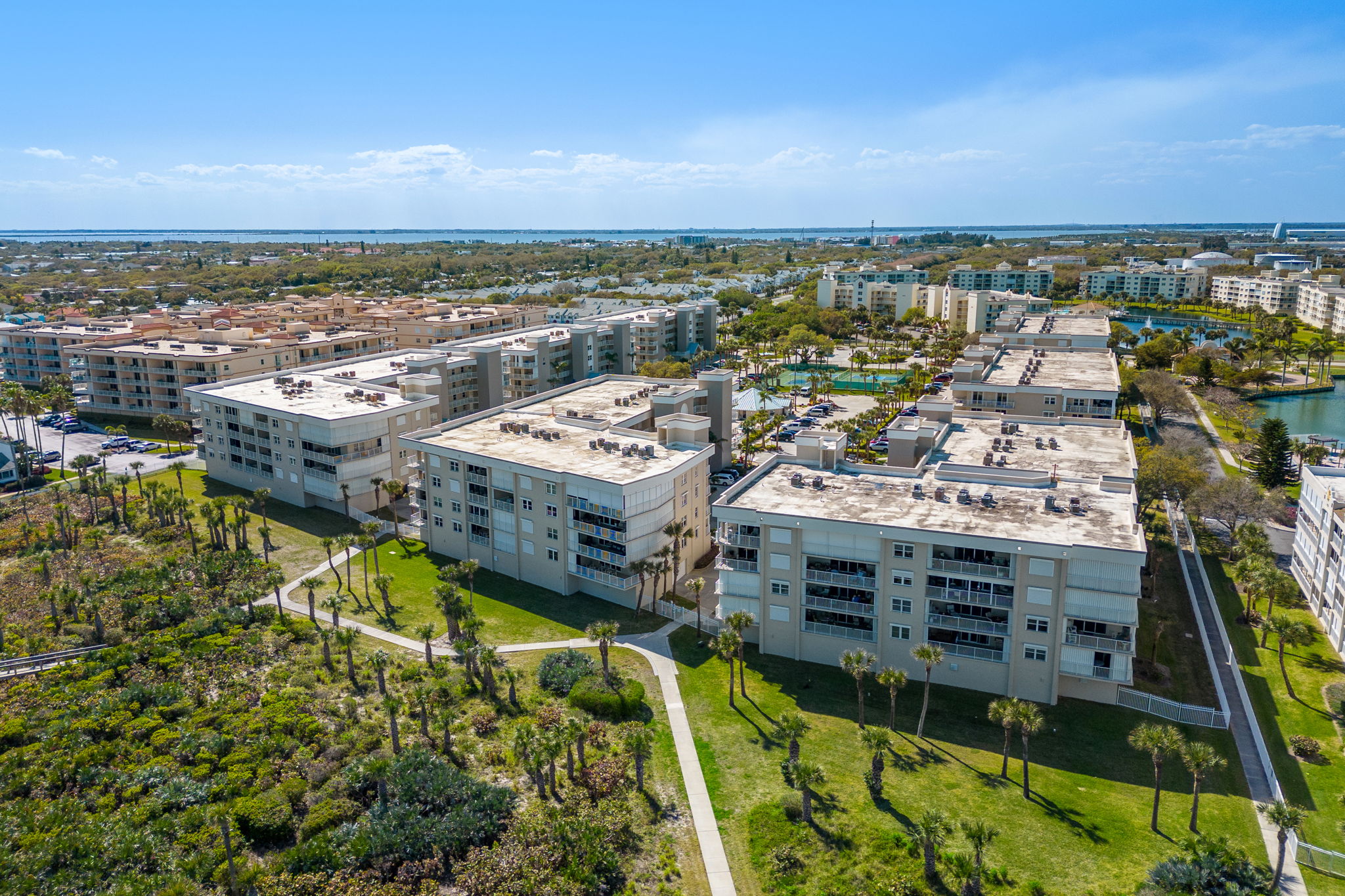 701 Solana Shores Drive, Unit 306 Cape Canaveral, FL 32920 - Photo 16 of 23 a view of a city with tall buildings