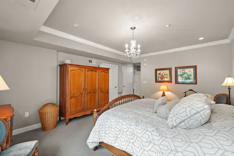 a bathroom with a double vanity sink mirror and shower