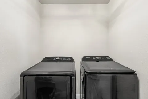 a view of backyard with seating area and green space