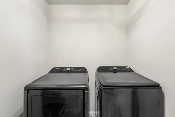 a view of backyard with seating area and green space