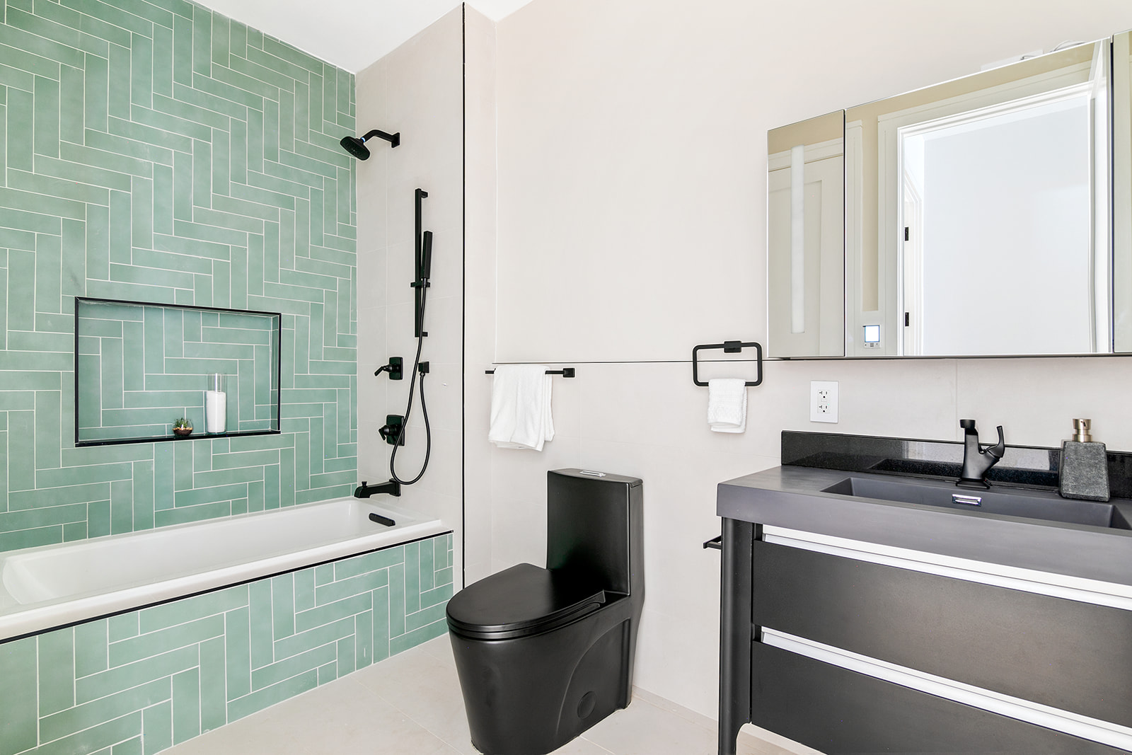 1251 Pacific Street, Unit 1A Brooklyn, NY 11216 - Photo 8 of 13 a bathroom with a sink a toilet and bathtub