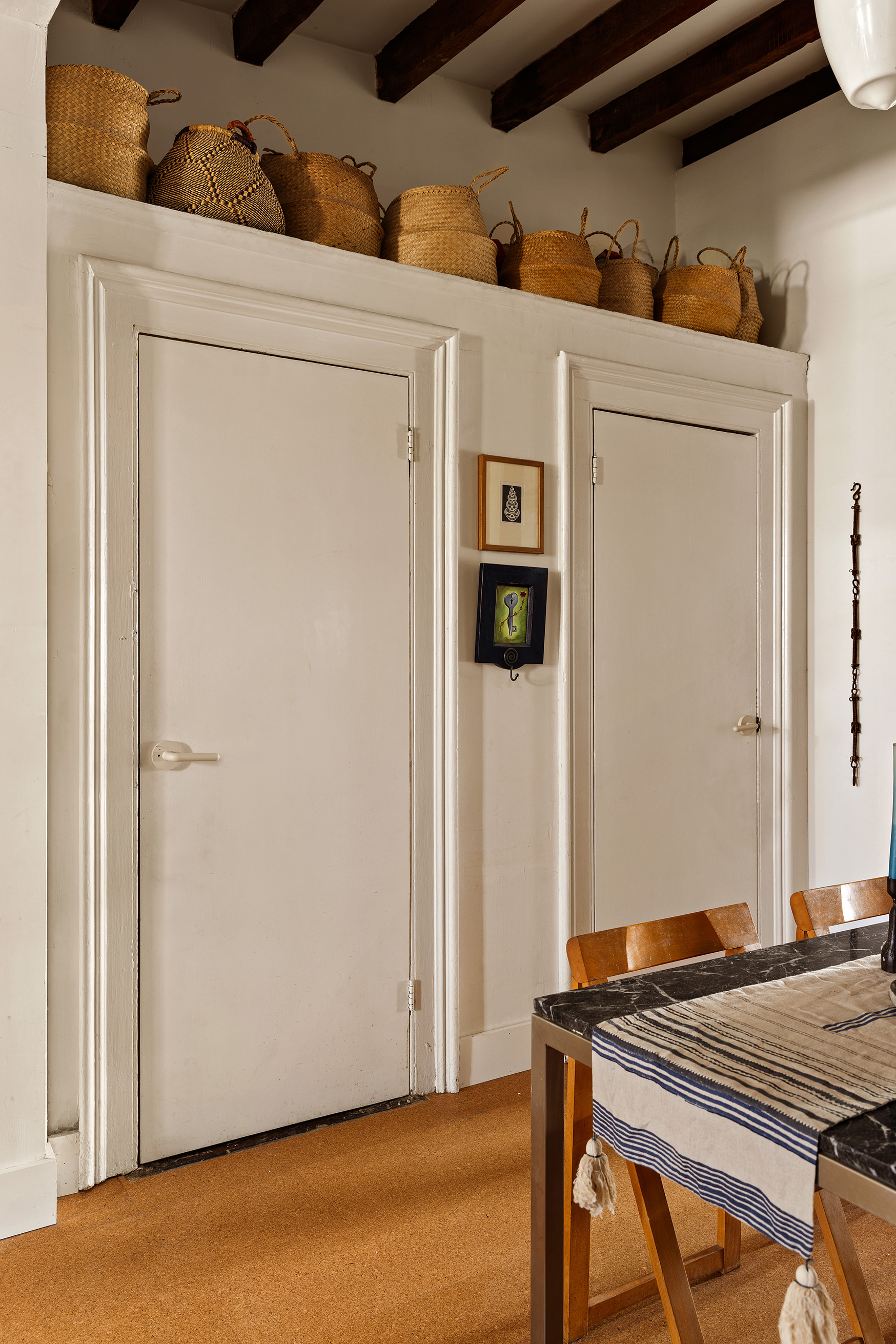 151 Grand Street, Unit 8 Brooklyn, NY 11249 - Photo 8 of 20 a bed room with a bed and a table