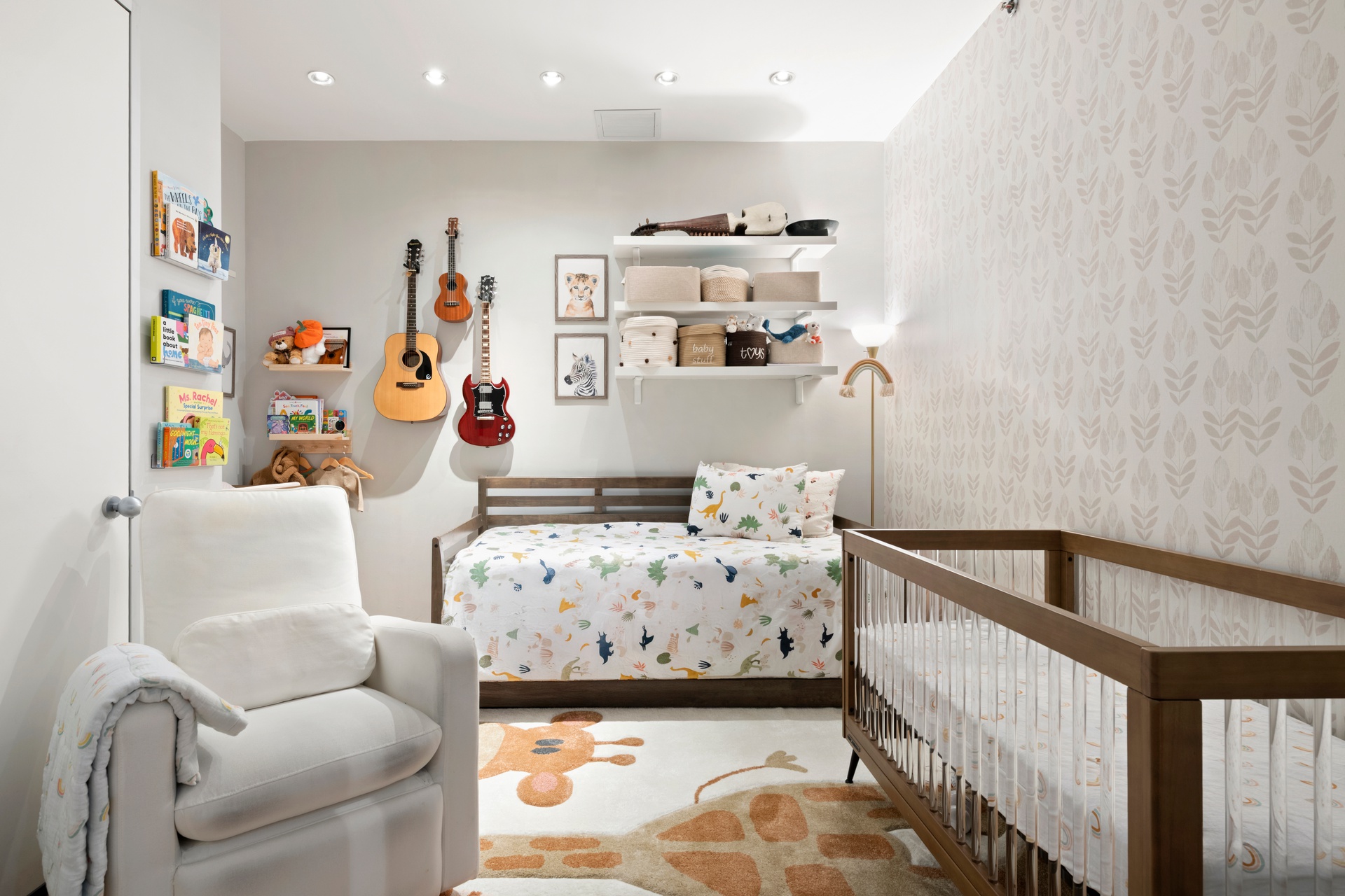 419 West 55th Street, Unit 2D Manhattan, NY 10019 - Photo 7 of 10 a bedroom with furniture and baby crib