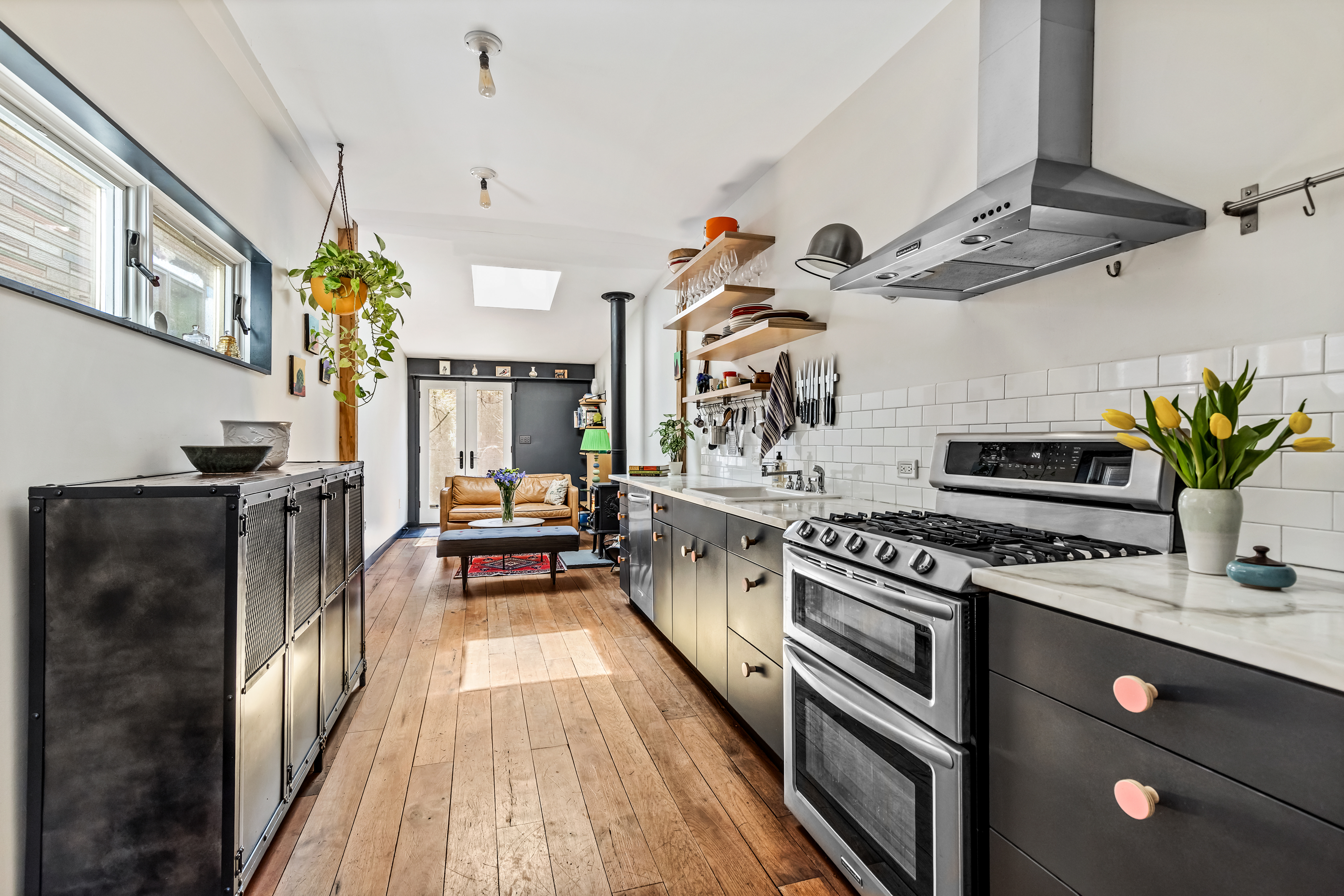 162 10th Street Brooklyn, NY 11215 - Photo 1 of 13 a kitchen with stainless steel appliances granite countertop a stove a sink dishwasher and a refrigerator