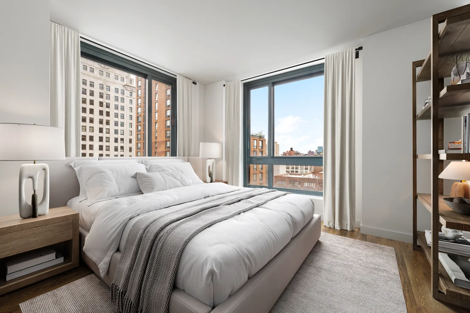 a bedroom with a bed a large window and walk in closet