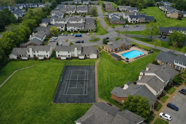 an aerial view of a house with a garden