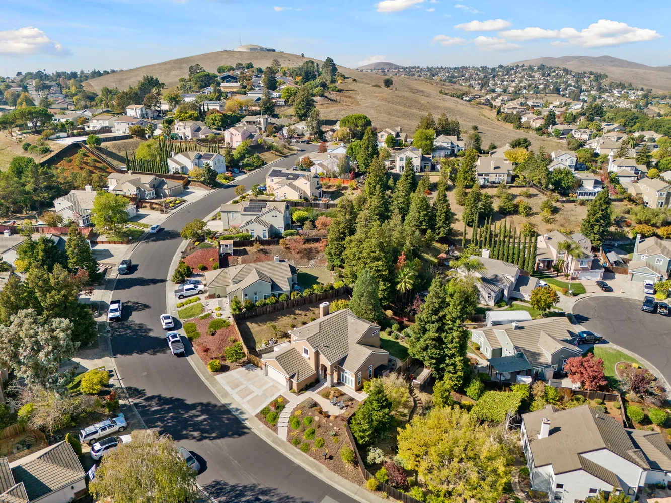 an aerial view of residential houses with outdoor space
