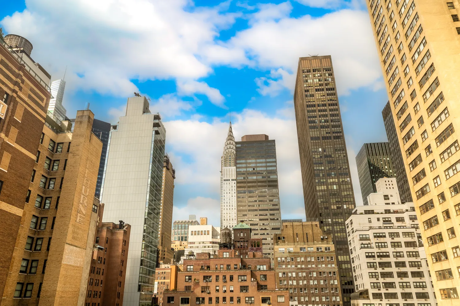 a view of a city with tall buildings