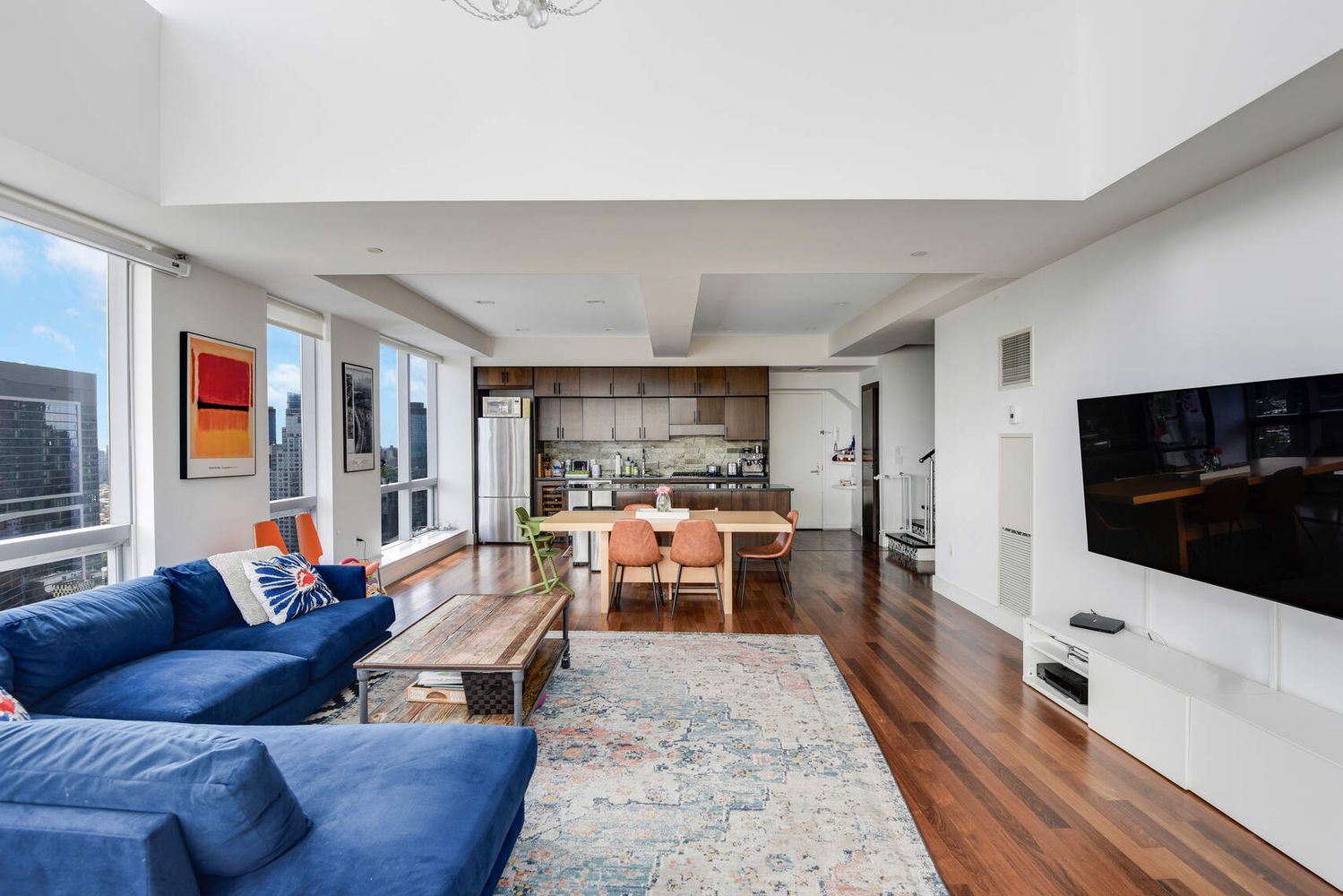 150 Myrtle Avenue, Unit PH3201 Brooklyn, NY 11201 - Photo 8 of 40 a living room with furniture and a flat screen tv