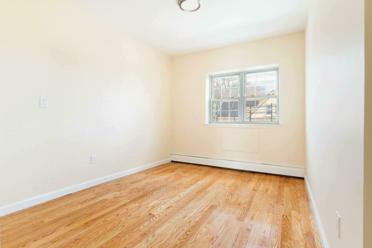 71-01 Cooper Avenue, Unit 3FAM Queens, NY 11385 - Photo 8 of 12