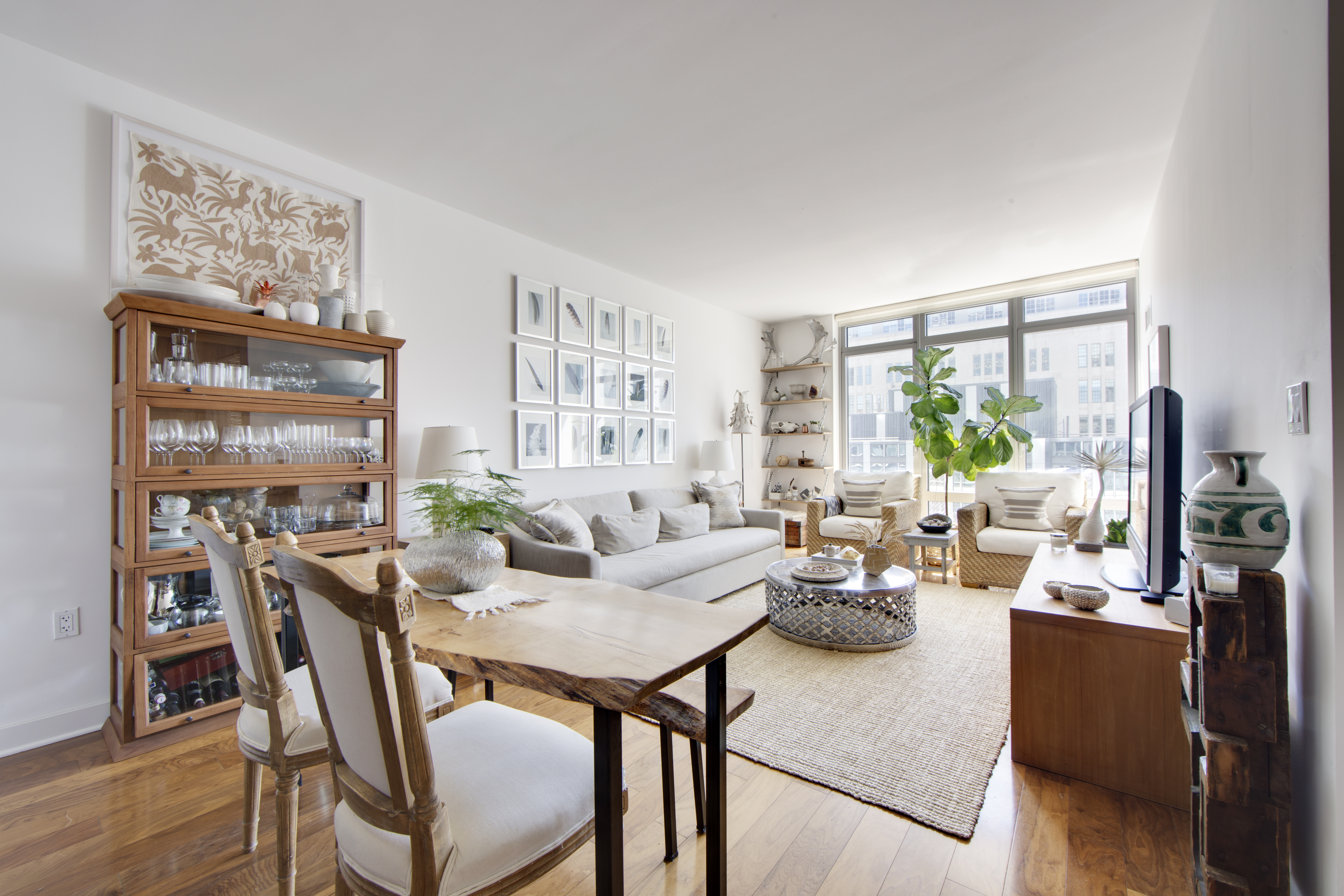 2 Northside Piers, Unit 4B Brooklyn, NY 11249 - Photo 4 of 18 a living room with furniture and large windows