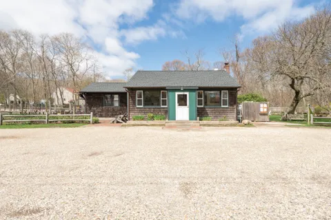 a front view of a building with street view