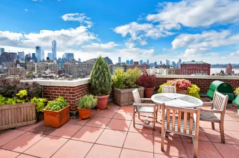 a view of a chairs and table in the terrace