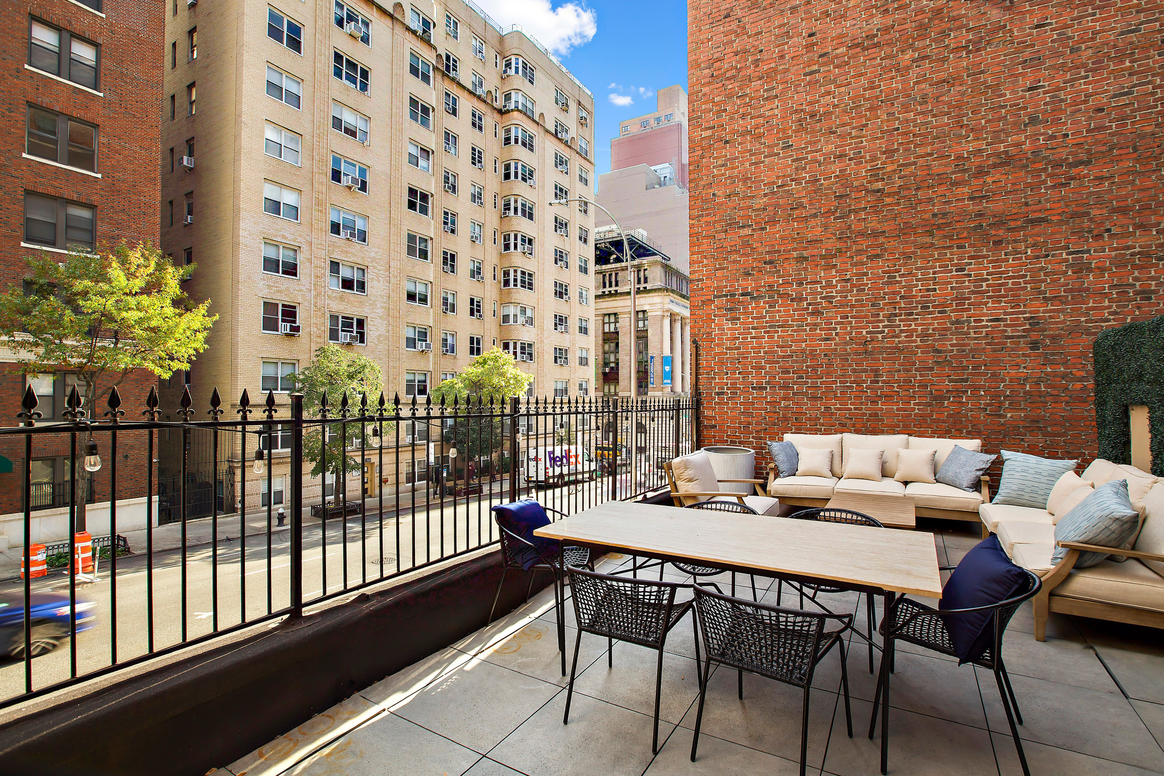 134 East 36th Street Manhattan, NY 10016 - Photo 27 of 28 a view of a balcony with chairs