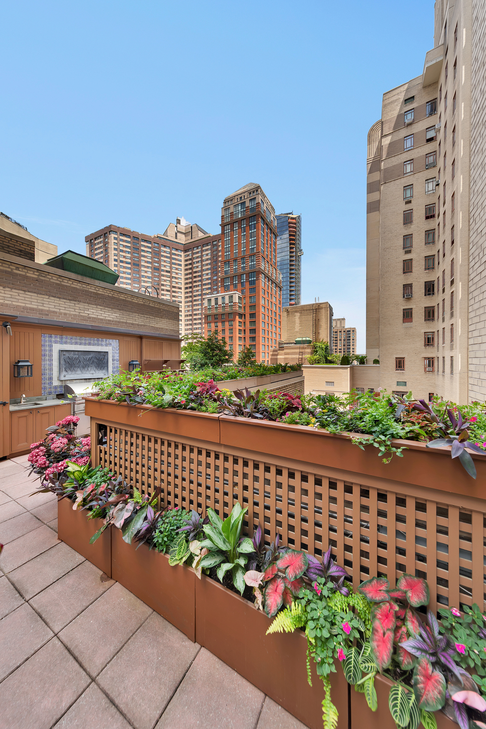 25 Central Park West, Unit 21J Manhattan, NY 10023 - Photo 12 of 37 a city view with tall buildings