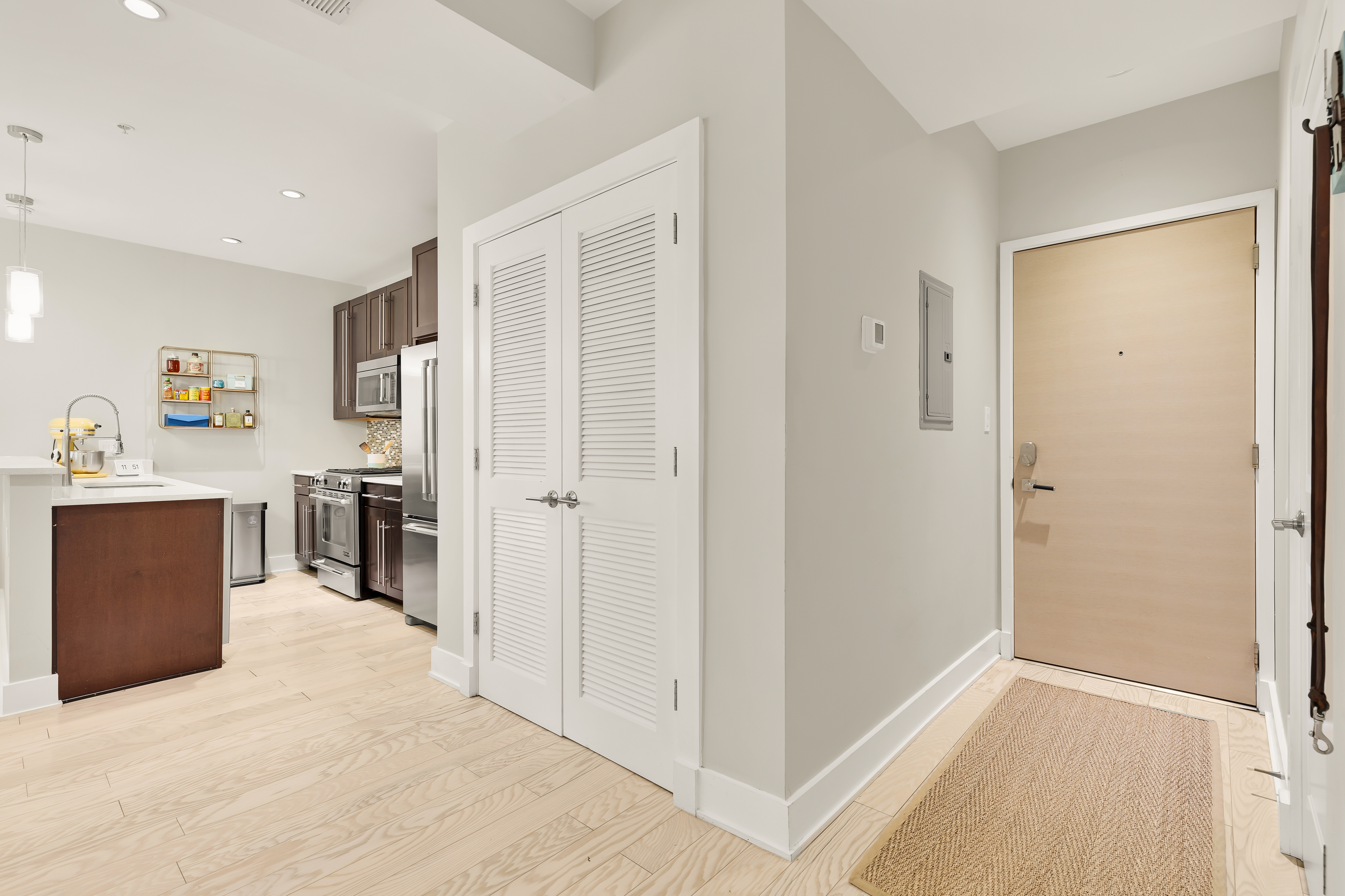 2101 11th Street Northwest, Unit 403 Washington, DC 20001 - Photo 4 of 30 a view of a kitchen with wooden floor