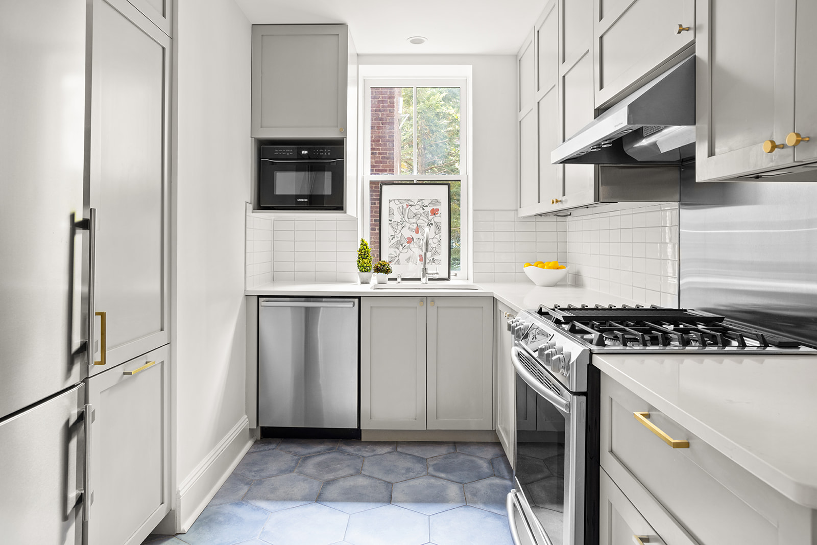 35-16 79th Street, Unit 1 Queens, NY 11372 - Photo 4 of 14 a kitchen with a stove and a refrigerator