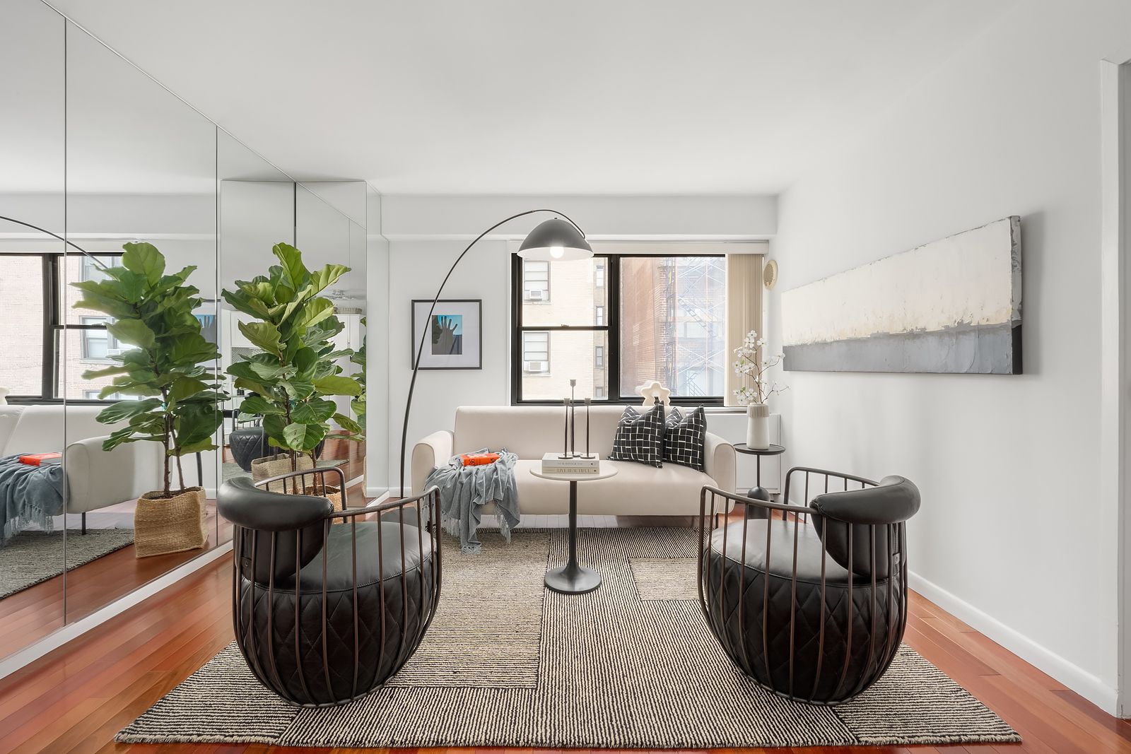 178 East 80th Street, Unit 7F Manhattan, NY 10075 - Photo 3 of 10 a living room with furniture and a potted plant