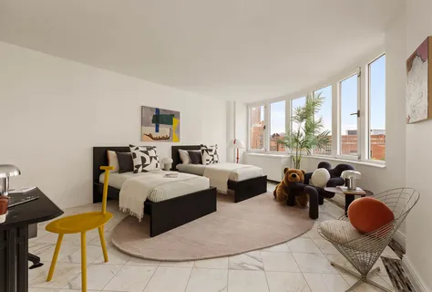 a view of a workspace with furniture