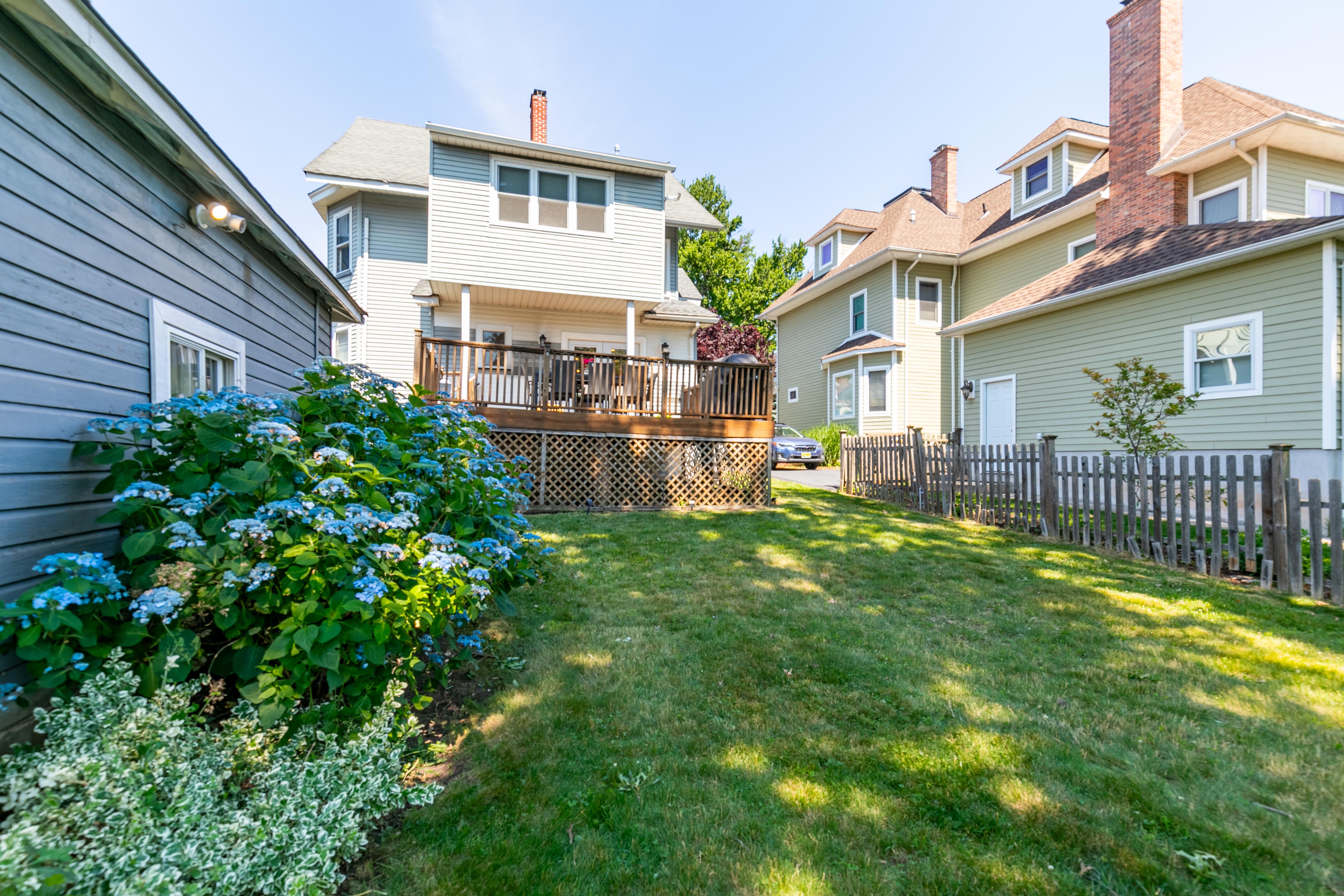163 Ridge Road Rutherford, NJ 07070 - Photo 50 of 59 a front view of house with yard and outdoor seating
