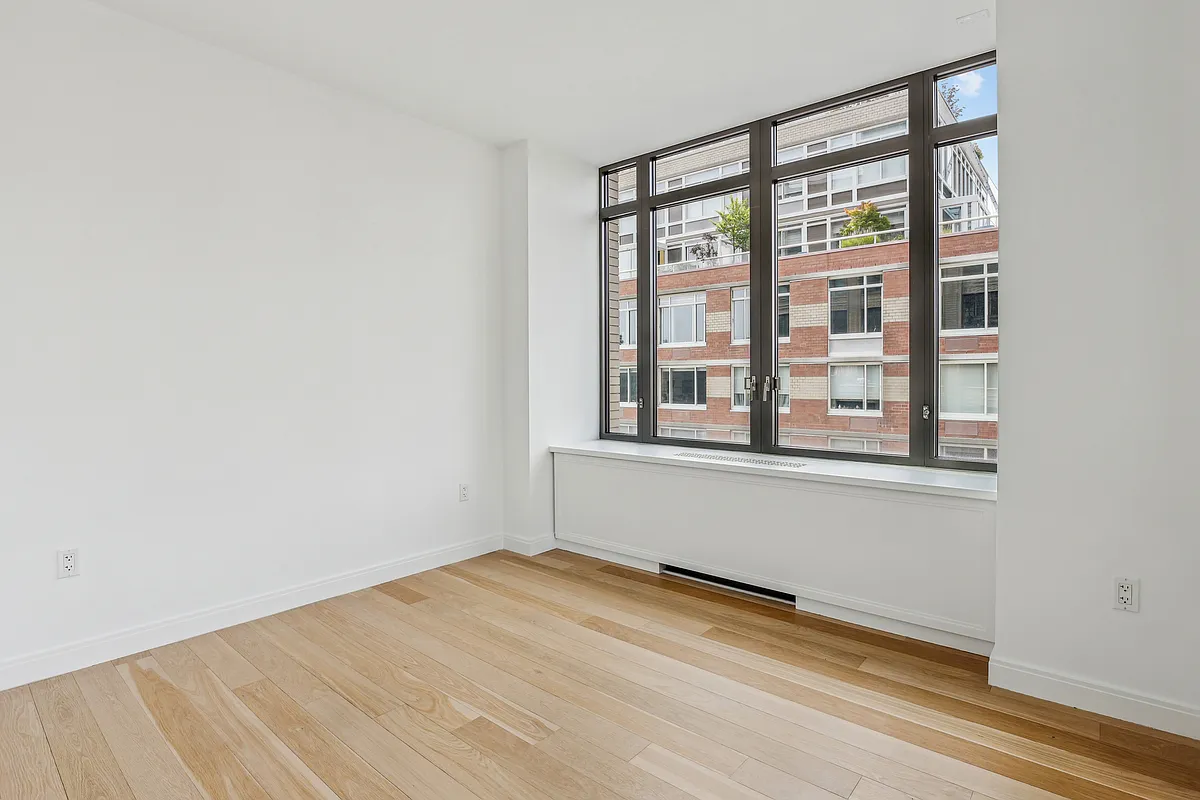 269 West 87th Street, Unit 14A Manhattan, NY 10024 - Photo 9 of 23 an empty room with a window