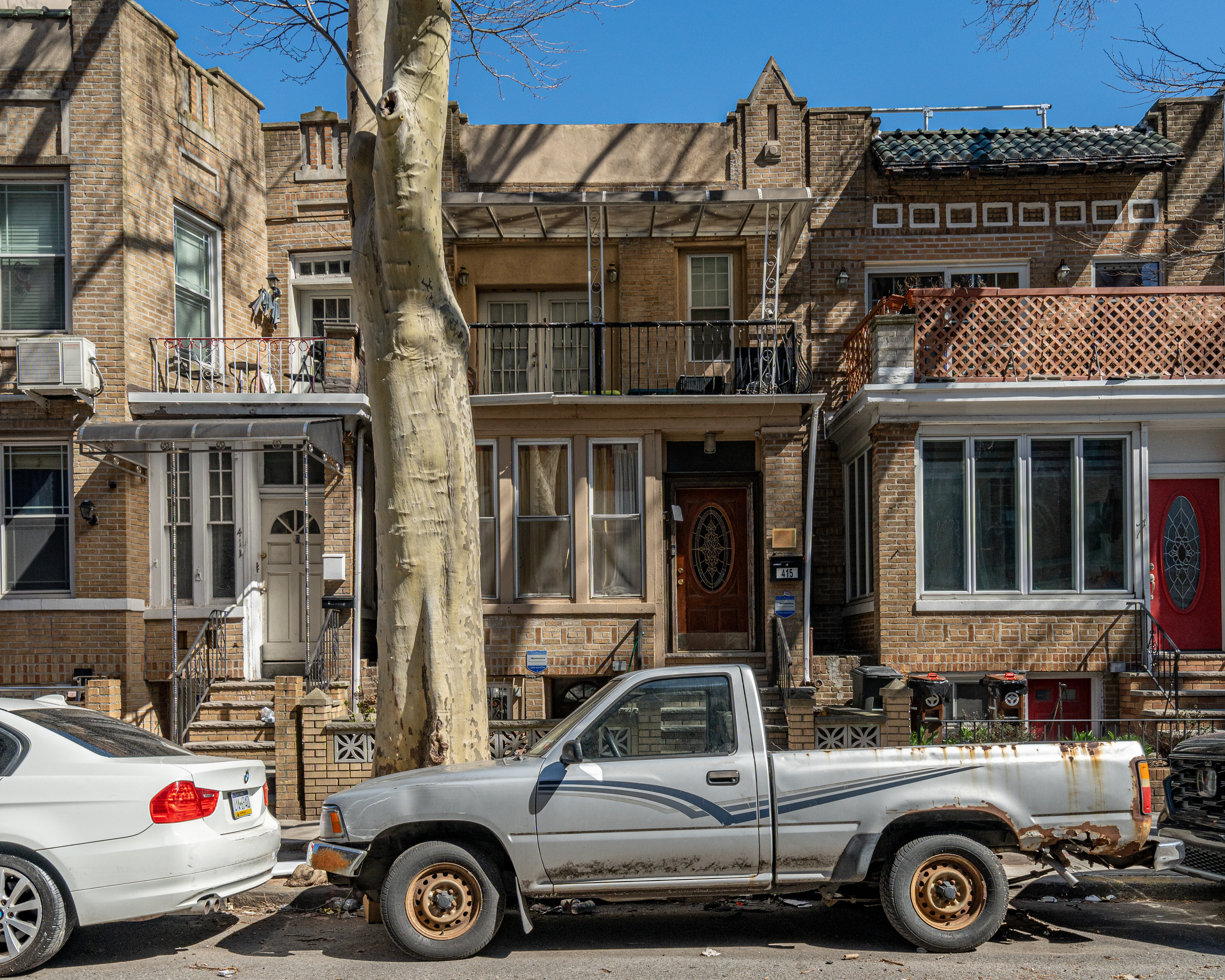 a front view of a house with parking space