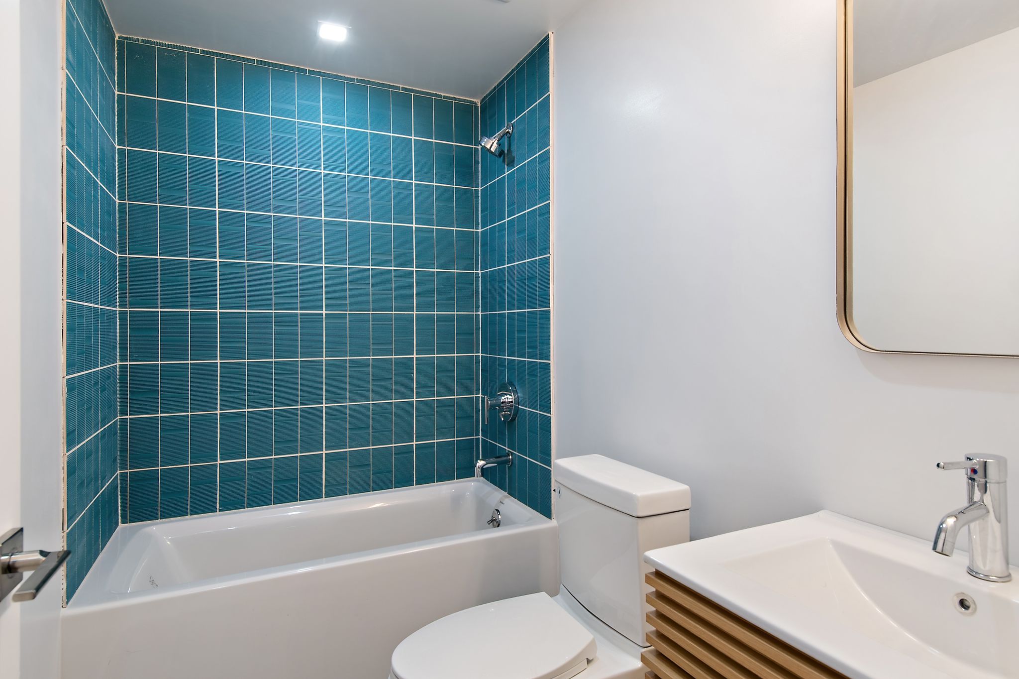 181 Kosciuszko Street Brooklyn, NY 11216 - Photo 17 of 20 a white bath tub sitting next to a white toilet