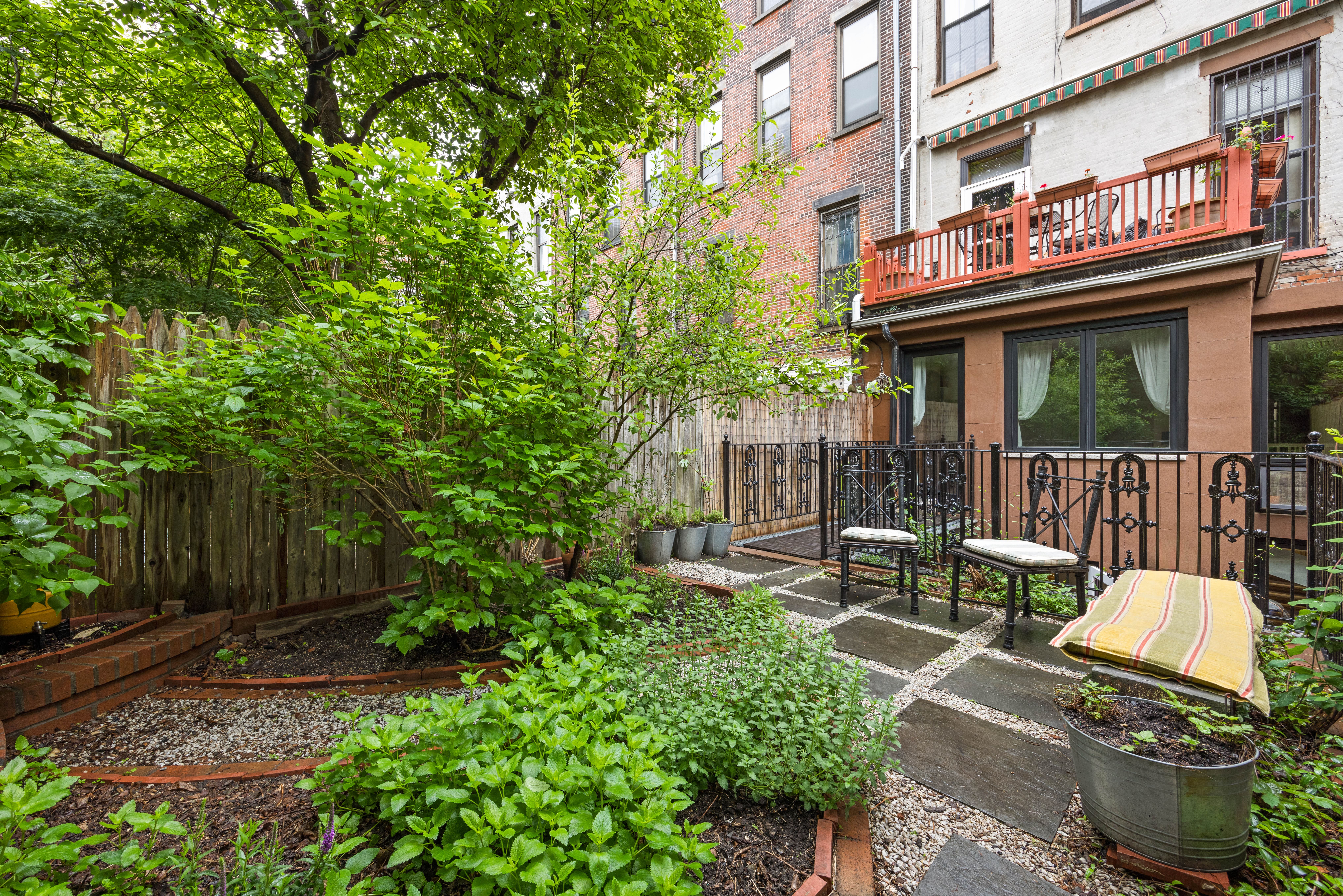 38 7th Avenue, Unit 1 Brooklyn, NY 11217 - Photo 6 of 13 a view of a chairs and table in the patio