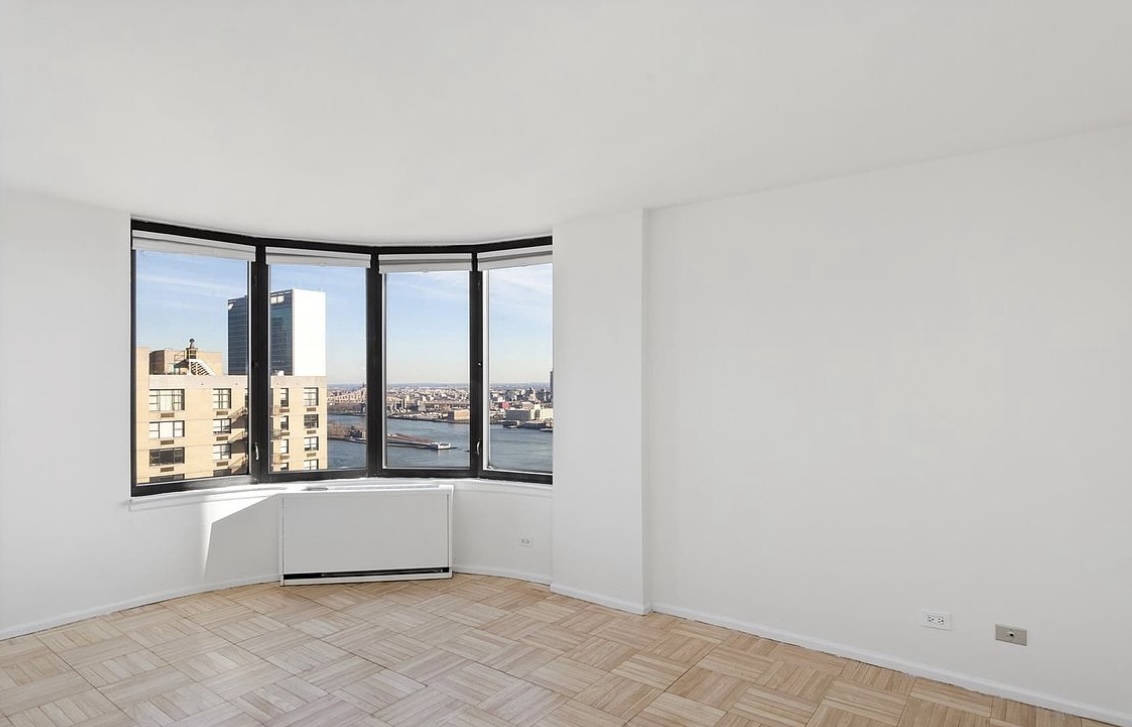 330 East 38th Street, Unit 38I Manhattan, NY 10016 - Photo 10 of 17 a view of an empty room with a window