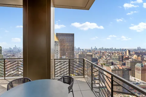 a view of a balcony with city view