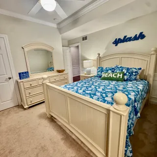 a bathroom with a toilet a sink and shower