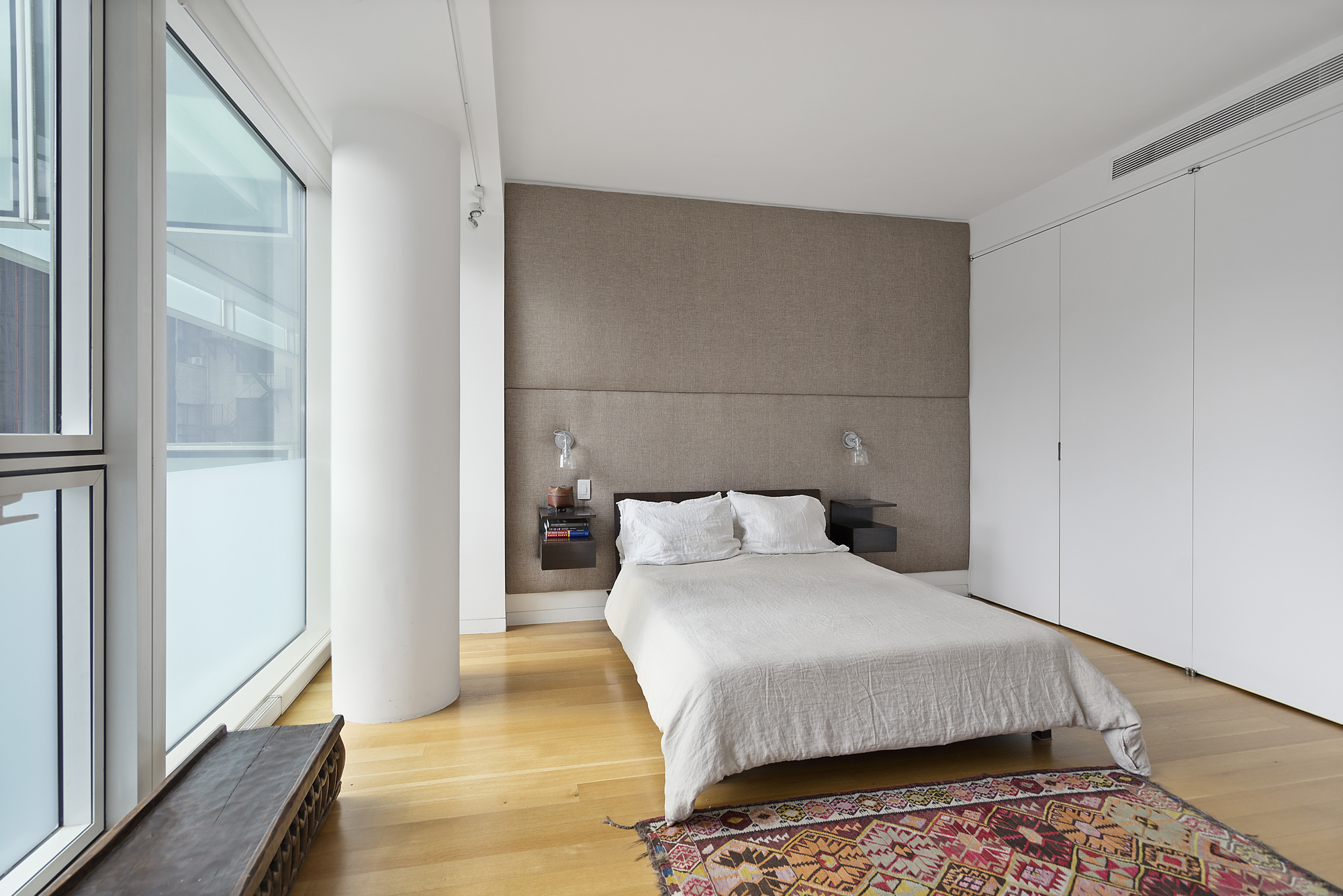 1 Grand Army Plaza, Unit 4B Brooklyn, NY 11238 - Photo 6 of 20 a bedroom with a bed and a window