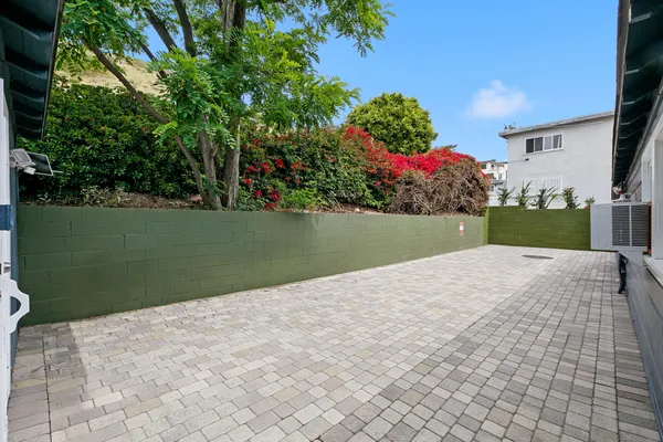 a view of a garden with a pathway